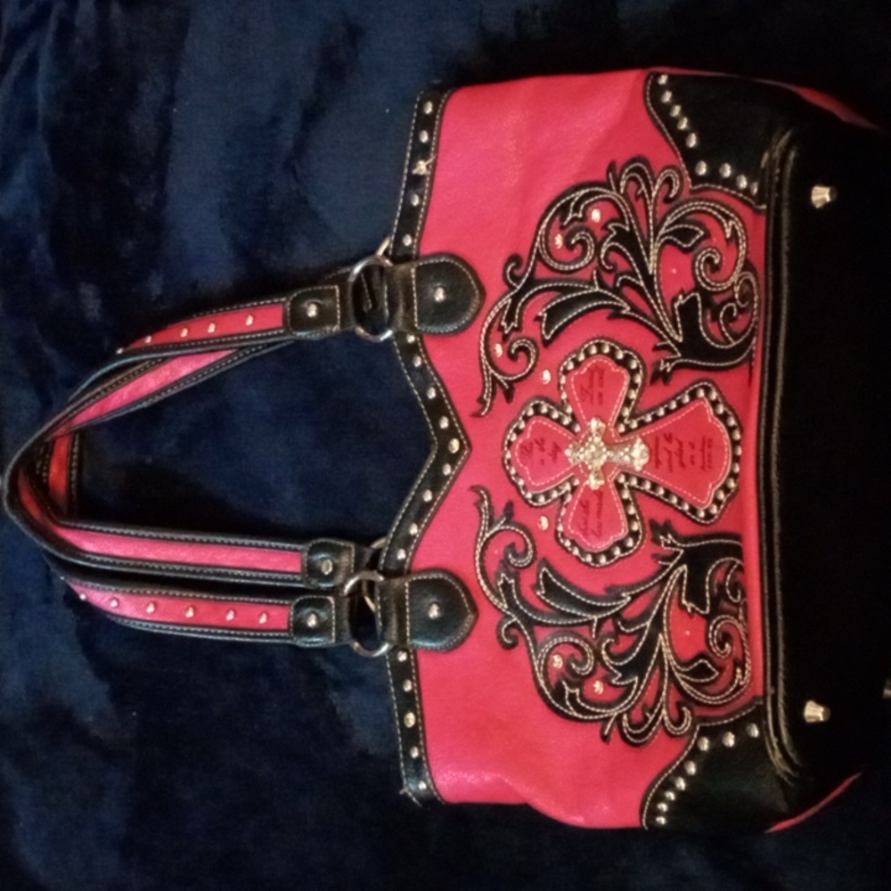 Purse with a cross on it